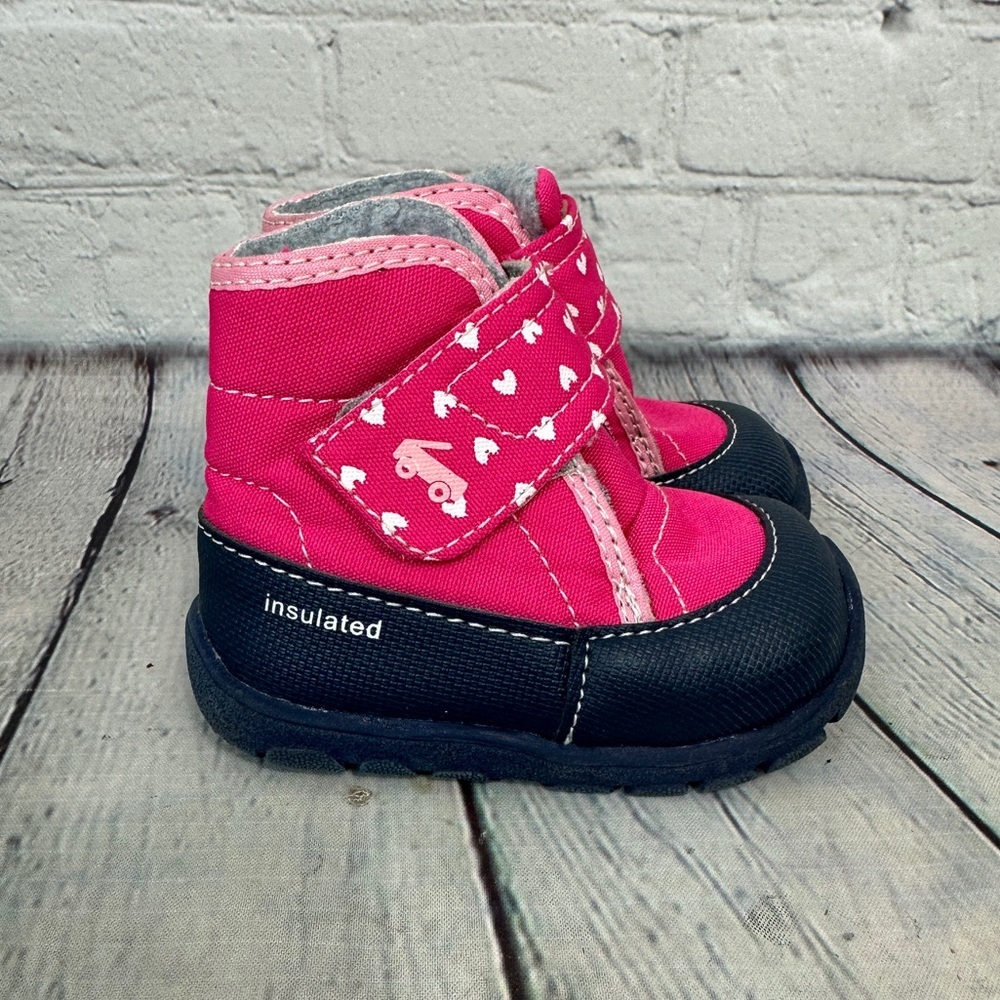 See Kai Run Girls' Blake Winter Boots in pink with a heart pattern size 4